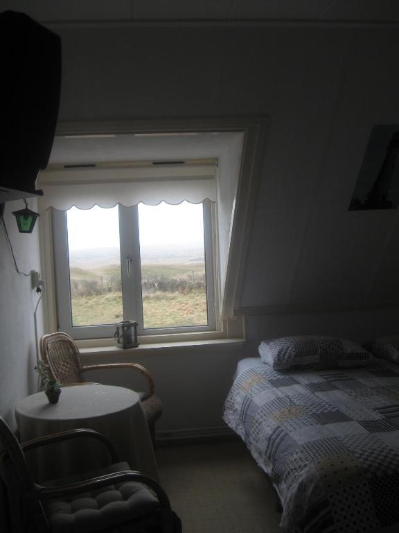 Thuis Bij Frans En Els Acomodação com café da manhã De Cocksdorp  Quarto foto